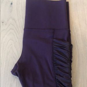 Athleta mesh me up stash pocket tights.